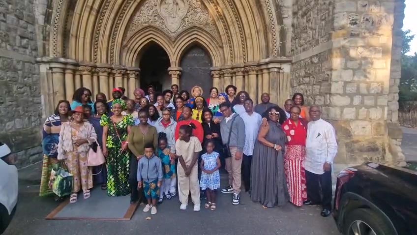 The whole family at the church doors